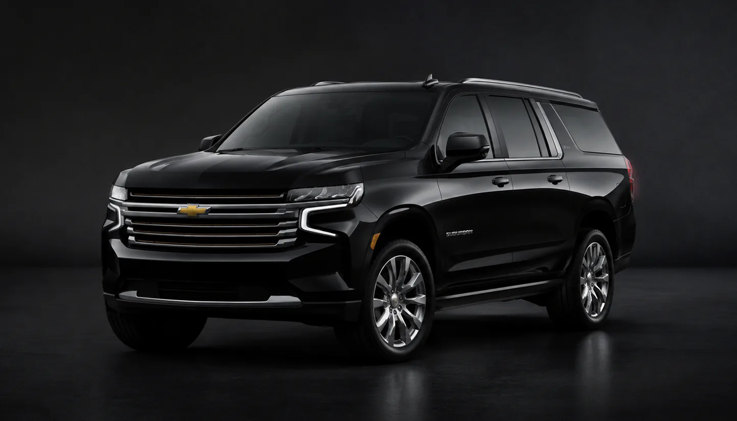 Carry's launch vehicle: a black Chevrolet Suburban, photographed in a dark studio.